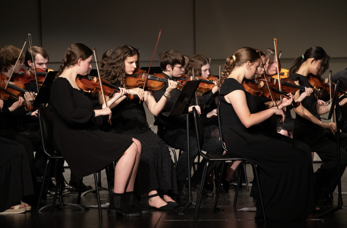 Musicians from the mixed string class play “Battlesong” by Randall Standridge. 